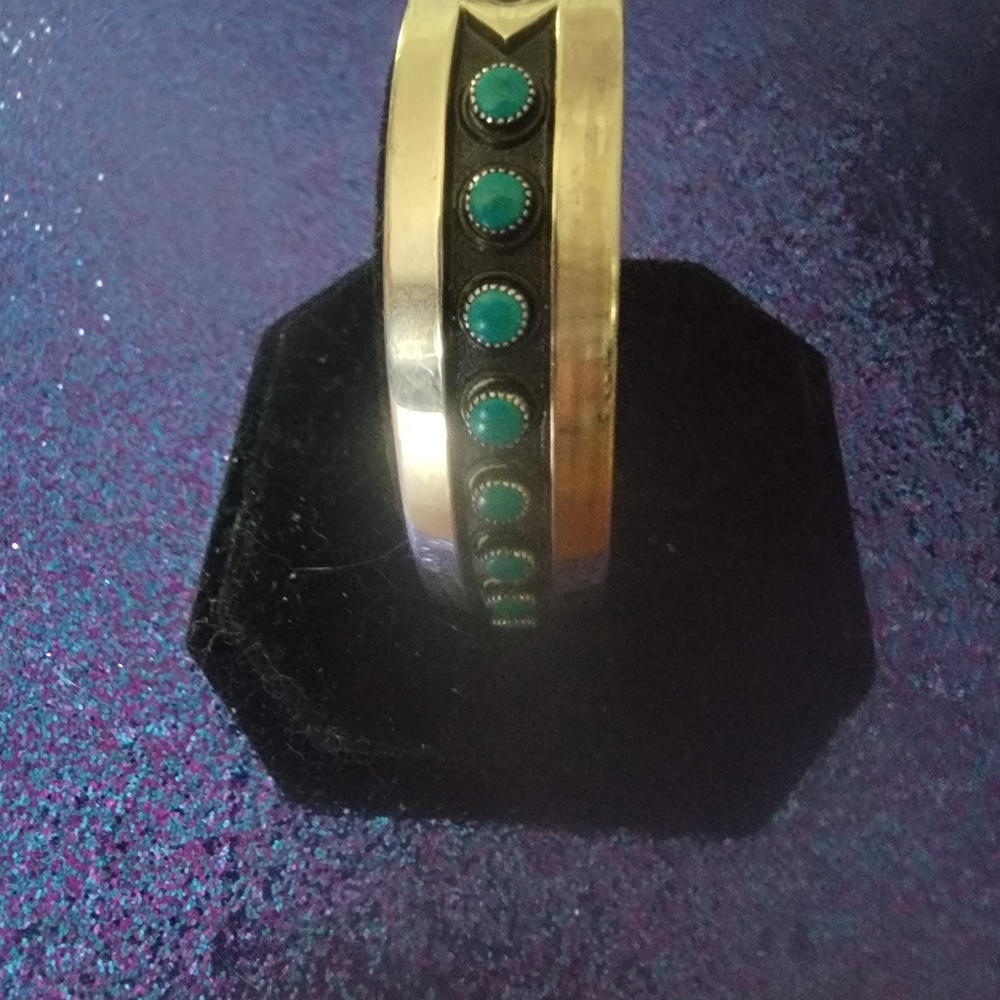 VINTAGE STERLING SILVER W/ 8 TURQOISE STONES.NAVAJO CUFF BRACELET.SIGNED.$68.00